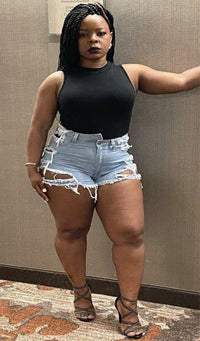 Torn apart offset denim shorts